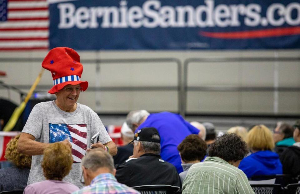 Myrtle Beach resident Joe Ferrero chats with friends ahead of a rally for Democratic presidential candidate Bernie Sanders at the Myrtle Beach Convention Center Wednesday afternoon in Myrtle Beach.