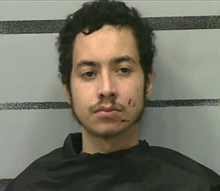 This photo provided by the Lubbock County Detention Center show Omar Soto-Chavira. Omar Soto-Chavira, a man charged in the fatal shooting of a SWAT officer in a small West Texas city during a standoff last week was charged Friday, July 23, 2021 with assaulting a federal officer who responded to the scene, prosecutors said. (Lubbock County Detention Center via AP)