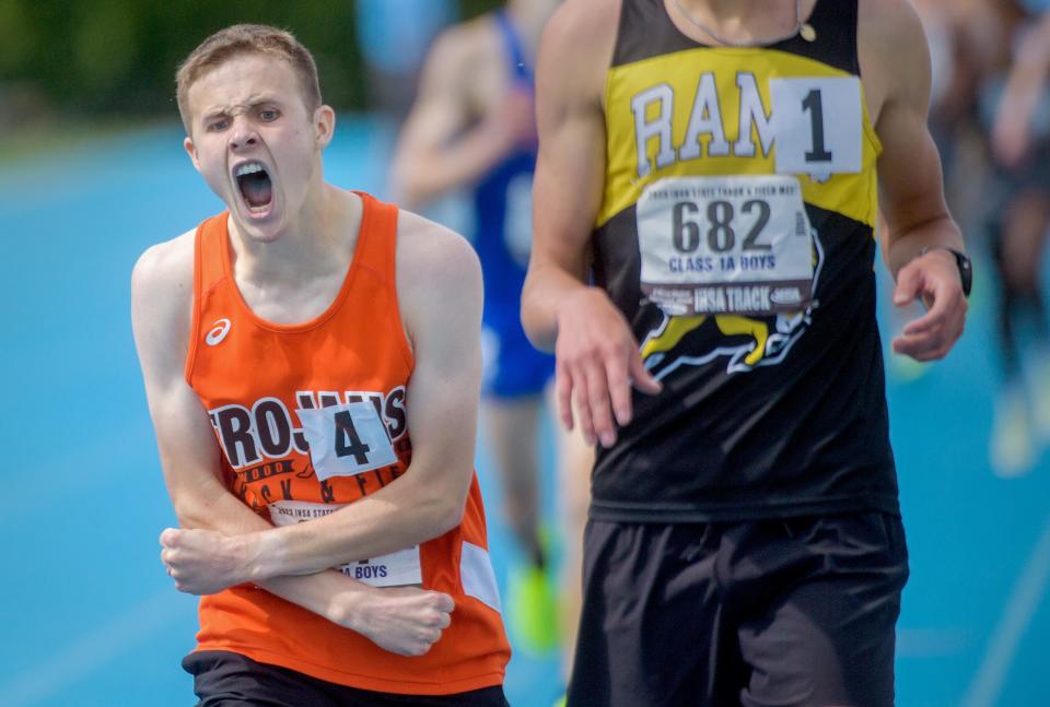 Elmwood's Isaiah Hill reacts at the finish line after sprinting from behind to take second place behind Riverdale's Tommy Murray in the Class 1A state 1600-meter run Saturday, May 27, 2023 at Eastern Illinois University in Charleston.