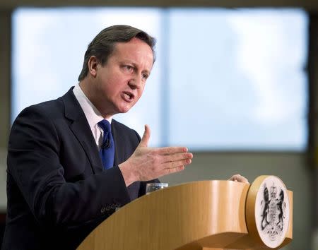 Britain's Prime Minister David Cameron delivers a speech at JCB World Headquarters in Rocester, central England November 28, 2014. REUTERS/Oli Scarff/Pool