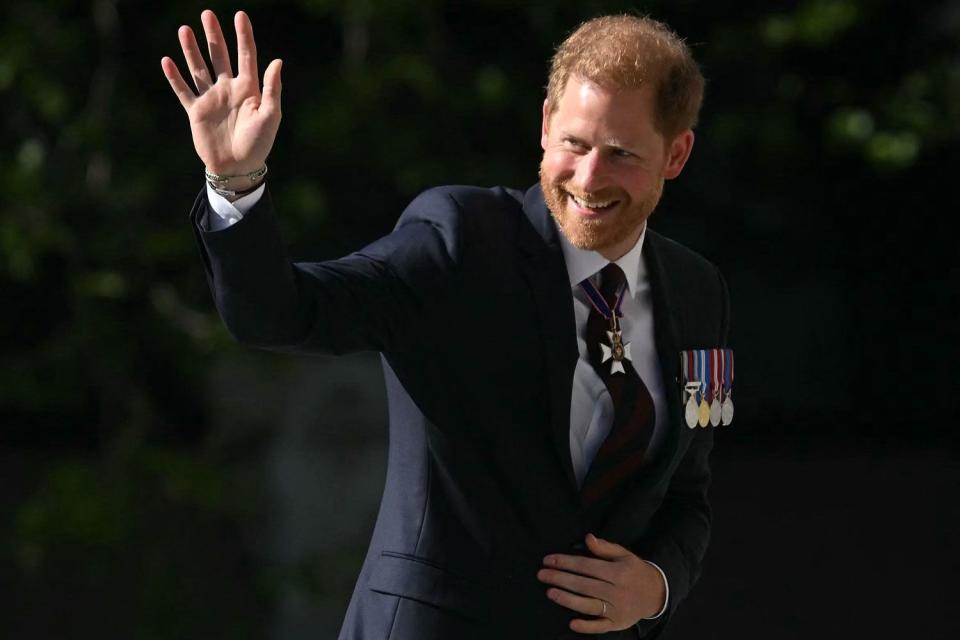 <p>JUSTIN TALLIS/AFP via Getty</p> Prince Harry arrives for the Invictus Games anniversary service at St. Paul