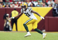 FILE - Green Bay Packers cornerback Eric Stokes watches a play develop during the NFL football team's game against the Washington Commanders, Oct. 23, 2022 in Landover, Md. Stokes has been activated from the physically unable to perform list. This move clears the way for Stokes to play for the first time in nearly a year Sunday, Oct. 22, 2023, at Denver. (AP Photo/Daniel Kucin Jr., File)