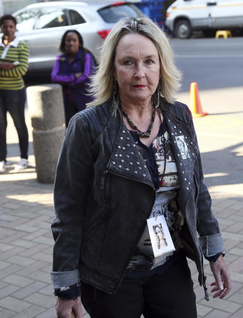 June Steenkamp, mother of Reeva Steenkamp, arrives for the Oscar Pistorius trail at the high court in Pretoria, South Africa, Wednesday, May 14, 2014. Pistorius is charged with murder for the shooting death of his girlfriend, Reeva Steenkamp, on Valentines Day in 2013. (AP Photo/Themba Hadebe)