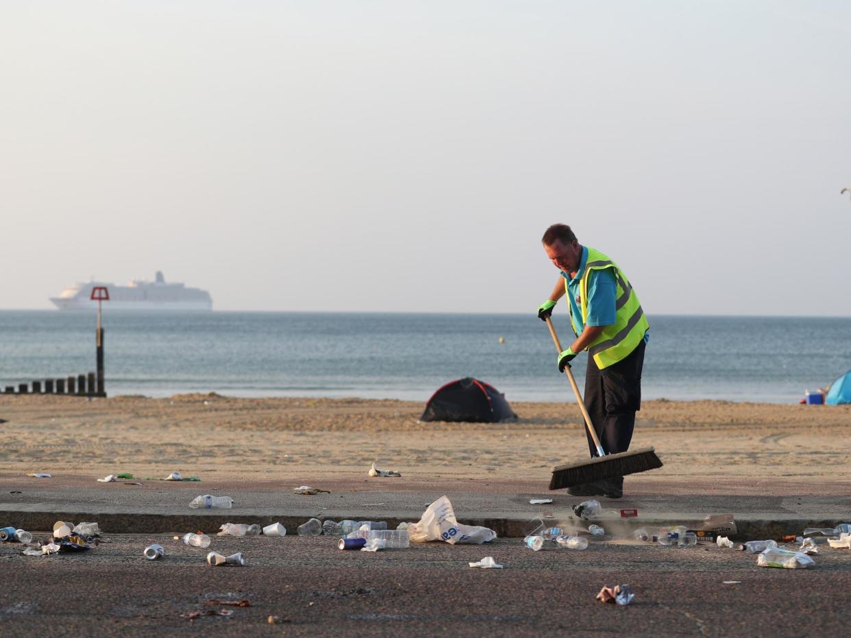 Councils across the south coast have had to organise litter picks after the heatwave daytrippers left: PA