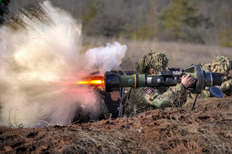 A Ukrainian serviceman fires an NLAW anti-tank weapon during an exercise in the Joint Forces Operation, in the Donetsk region (AP)