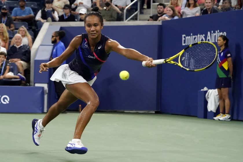 Leylah Fernandez, of Canada, returns to Angelique Kerber, of Germany.