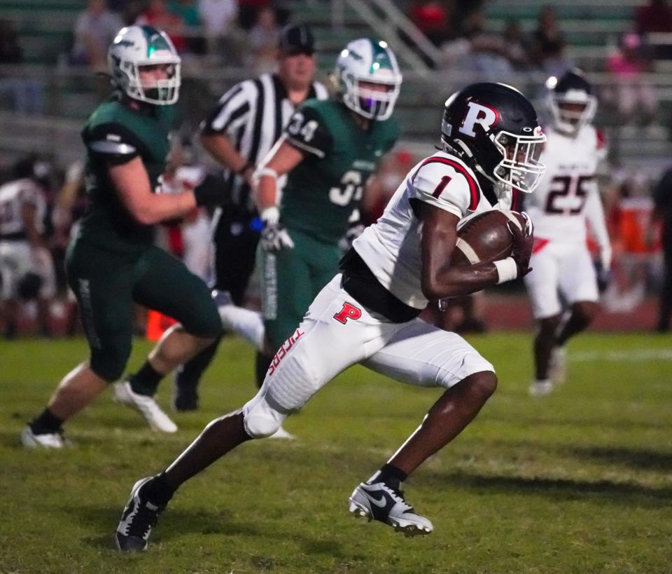 Palmetto wide receiver Dylan Wester runs up field during Friday night's game against Lakewood Ranch.