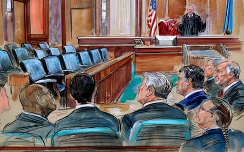 This courtroom sketch depicts US District court Judge TS Ellis III speaking to the lawyers and defendant Paul Manafort, fourth from left, as the jury continues to deliberate - Credit: Dana Verkouteren via AP