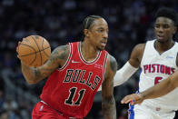 Chicago Bulls forward DeMar DeRozan (11) drives as Detroit Pistons guard Hamidou Diallo (6) defends during the second half of an NBA basketball game, Wednesday, Oct. 20, 2021, in Detroit. (AP Photo/Carlos Osorio)