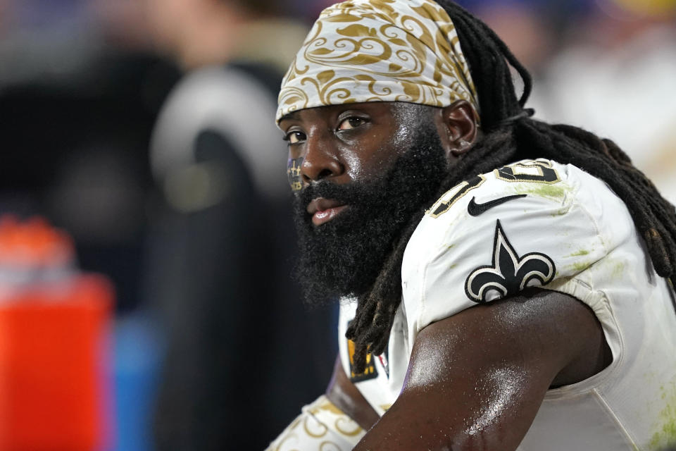 New Orleans Saints linebacker Demario Davis (56) sits on the bench during the second half of an NFL football game against the Arizona Cardinals, Thursday, Oct. 20, 2022, in Glendale, Ariz. (AP Photo/Matt York)