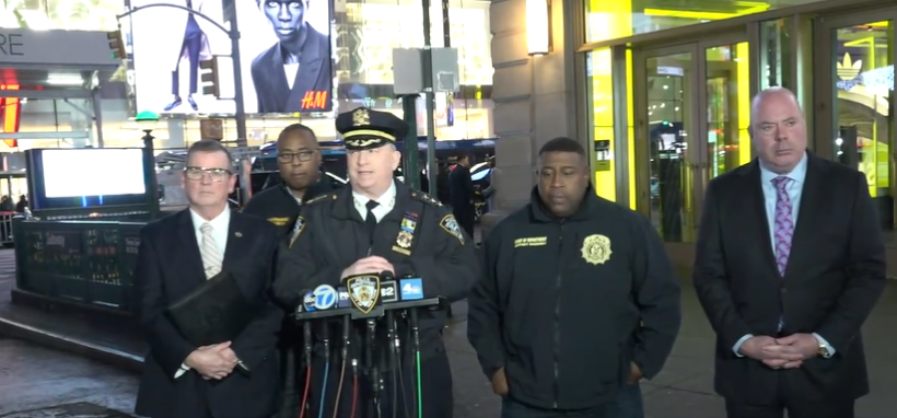 New York Police Department officials speak during a press conference on Feb. 8, 2024 after a customer was shot inside a business.