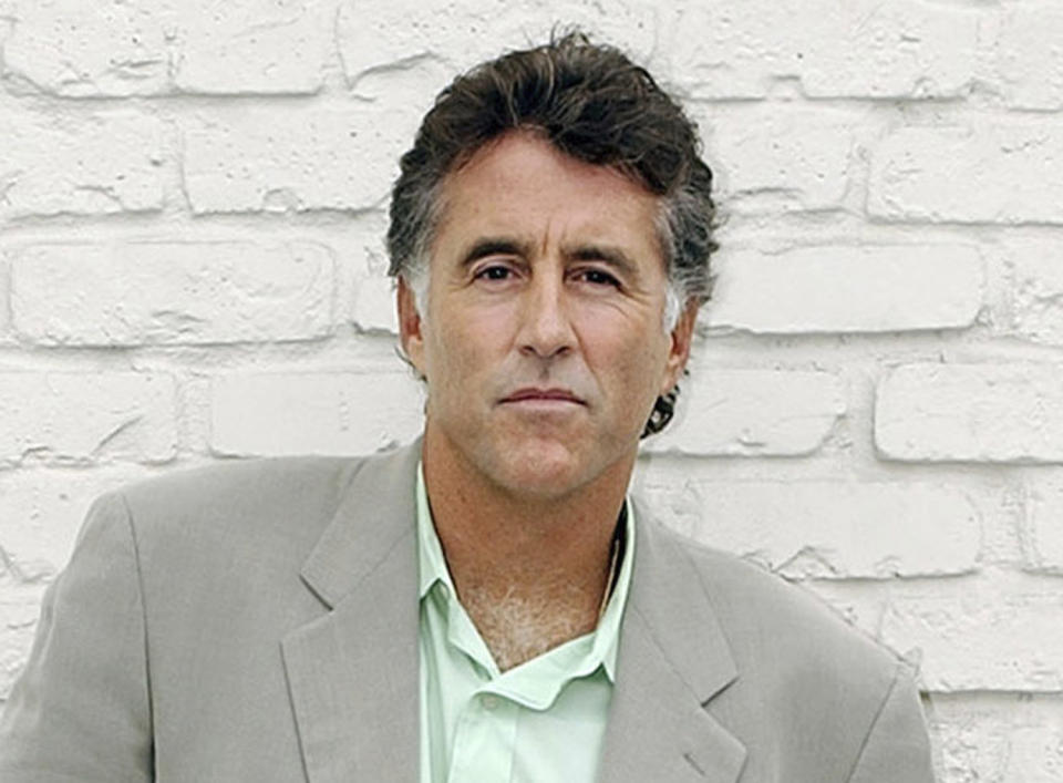 FILE - In this Sept. 16, 2005 file photo, Christopher Kennedy Lawford poses for a photograph in Encino, Calif., to promote his book, "Symptoms of Withdrawal: A Memoir of Snapshots and Redemption." Patrick Kennedy says Lawford died of a heart attack on Tuesday, Sept. 4, 2018, in Vancouver. He was 63. (AP Photo/Rene Macura, File)