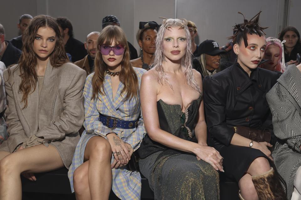 Barbara Palvin, from left, Victoria De Angelis, Julia Fox and Emma Chamberlain attend the Vivienne Westwood Fall/Winter 2024-2025 ready-to-wear collection presented Saturday, March 2, 2024 in Paris. (Photo by Vianney Le Caer/Invision/AP)