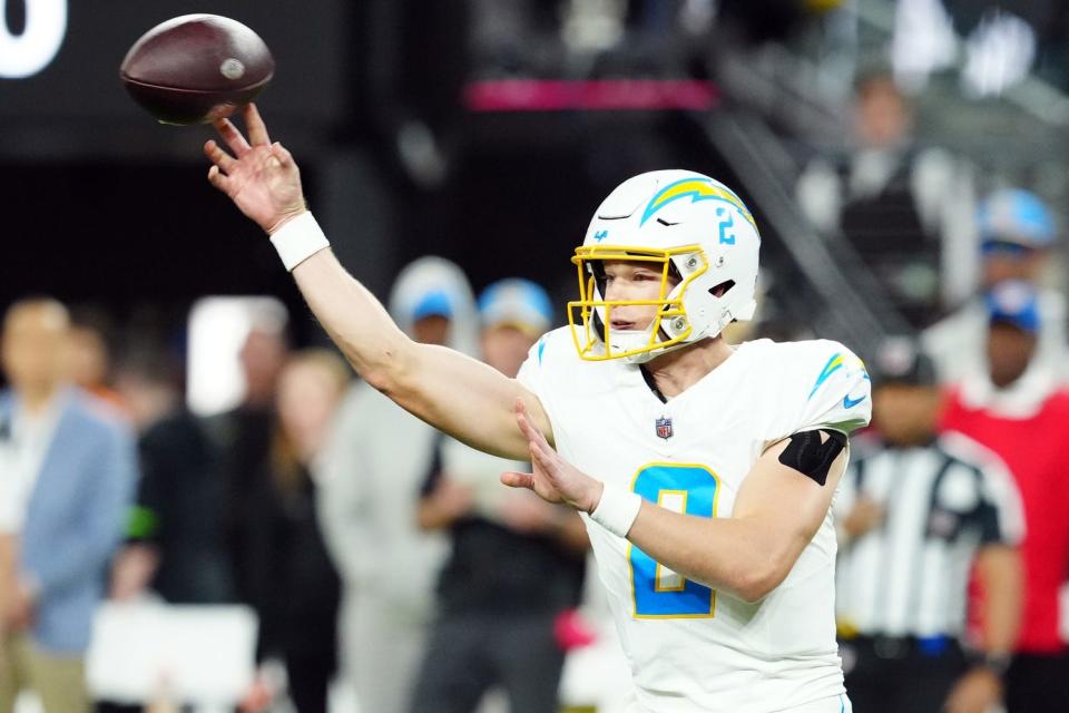 Dec 14, 2023; Paradise, Nevada, USA; Los Angeles Chargers quarterback Easton Stick (2) throws in the first quarter against the Las Vegas Raiders at Allegiant Stadium. Mandatory Credit: Stephen R. Sylvanie-USA TODAY Sports