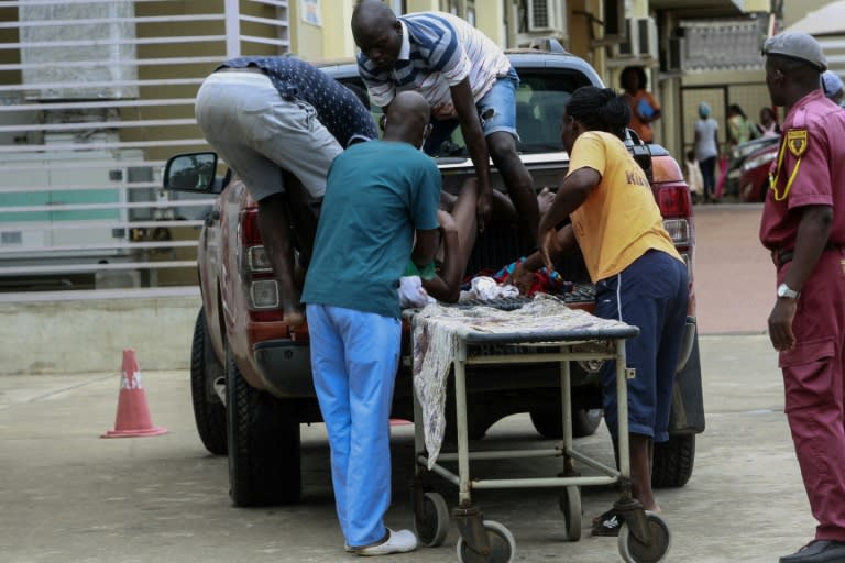 A malaria-stricken patient is taken to hospital in Luanda