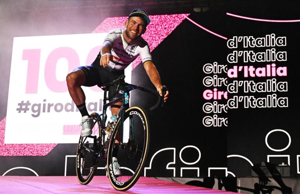 Mark Cavendish rides off stage at the Giro d'italia team presentation