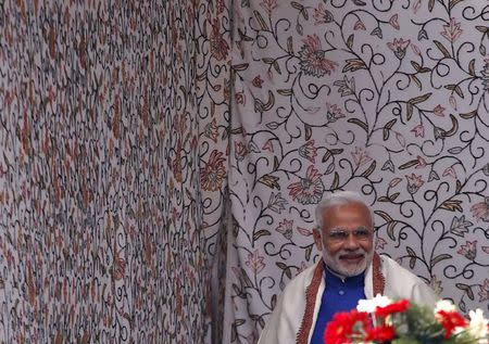 India's Prime Minister Narendra Modi departs after addressing a rally in a cricket stadium in Srinagar, November 7, 2015. REUTERS/Danish Ismail