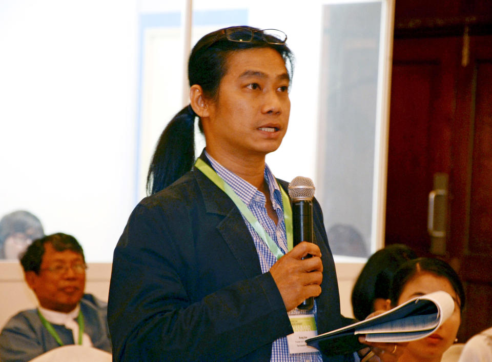 FILE - In this March 19, 2012 file photo, Aung Zaw, a prominent Myanmar exile who founded the independent Thailand-based Irrawaddy newspaper, speaks during the Media Development Conference in Yangon, Myanmar. Although international investors and foreign businessmen have begun rushing into Myanmar to take advantage of the rapidly changing climate there, and tourism numbers are on the rise, Aung Zaw estimated the number of exiles who've gone back so far at only "a few dozen" - and most of those are only visiting (AP Photo)