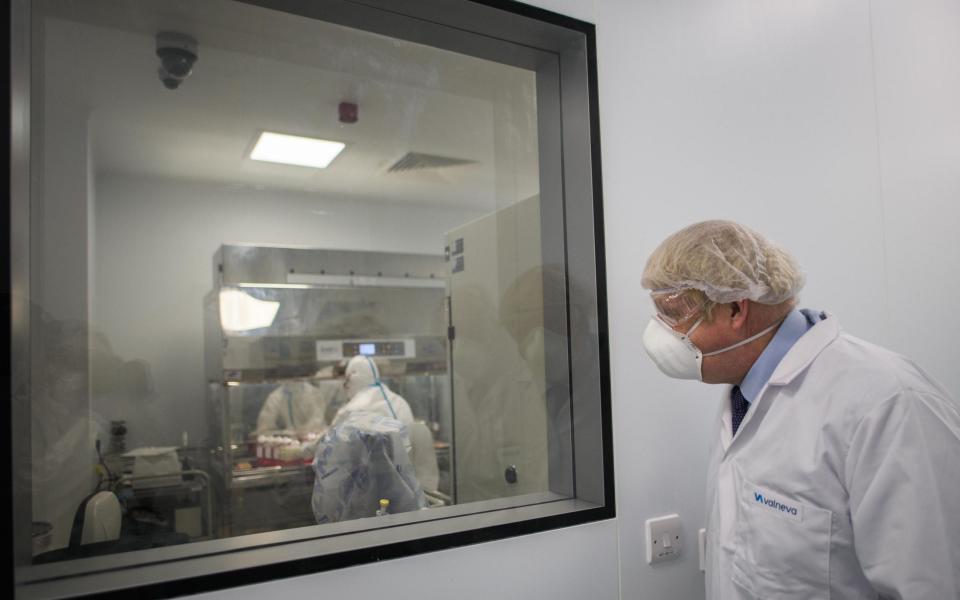 Prime Minister Boris Johnson on a visit to the Valneva biotechnology laboratory in Livingston, Scotland, in January this year - Wattie Cheung/POOL/AFP via Getty Images