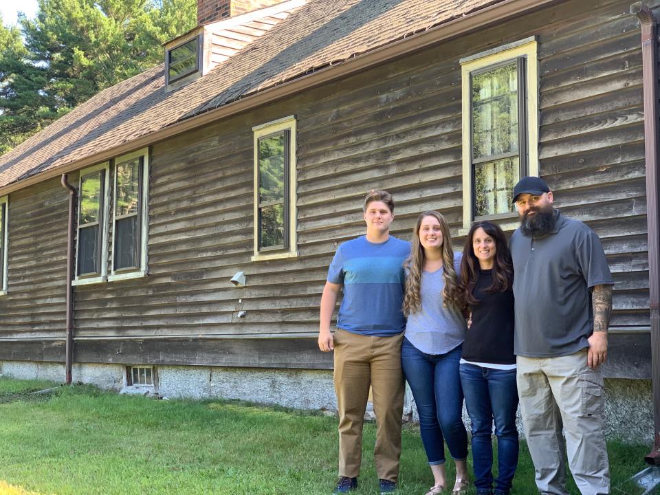 Cory Heinzen and his wife Jennifer, pictured with their son Kyler and daughter Madison, bought the haunted home that inspired "The Conjuring." (Photo: Katie Heinzen)