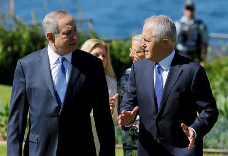 Israeli Prime Minister Benjamin Netanyahu (L) walks with Australian Prime Minister Malcolm Turnbull upon their arrival at Admiralty House in Sydney, Australia, February 22, 2017. REUTERS/Jason Reed