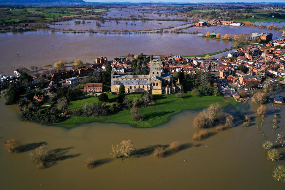 TEWKESBURY, ENGLAND - FEBRUARY 27:  Tewkesbury Abbey, at the confluence of the Rivers Severn and Avon, is surrounded by flood waters on February 27, 2020 in Tewskesbury, England. Flooding levels are decreasing after storms Ciara and Dennis, however forecasters are predicting more rain and 70mph winds this weekend from storm Jorge. (Photo by Christopher Furlong/Getty Images)