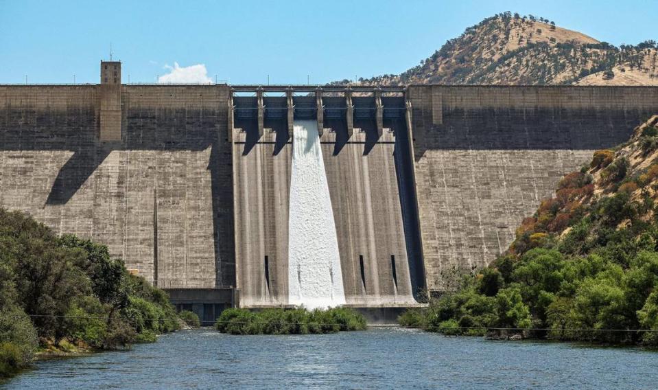 Pine Flat dam is showing releases over the dam spillway on Wednesday, July 19, 2023 with the lake reaching capacity after historic Sierra Nevada snowfall last winter and spring.