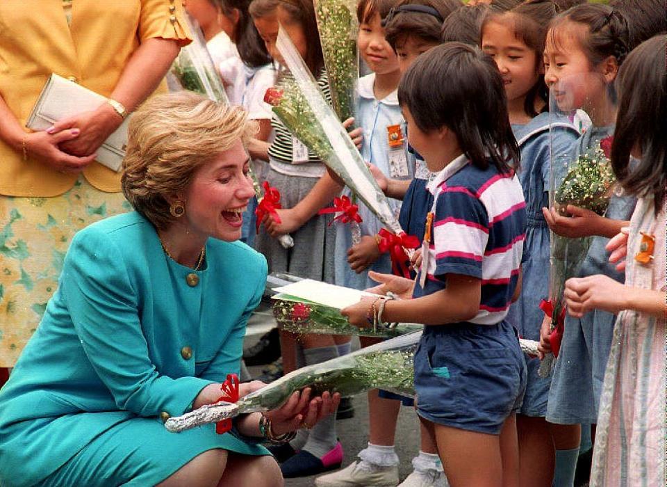 U.S. First Lady Hillary Rodham Clinton laughs as s