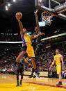 MIAMI, FL - JANUARY 19: Darius Morris #1 of the Los Angeles Lakers drives against Joel Anthony #50 of the Miami Heat during a game at American Airlines Arena on January 19, 2012 in Miami, Florida. NOTE TO USER: User expressly acknowledges and agrees that, by downloading and/or using this Photograph, User is consenting to the terms and conditions of the Getty Images License Agreement. (Photo by Mike Ehrmann/Getty Images)