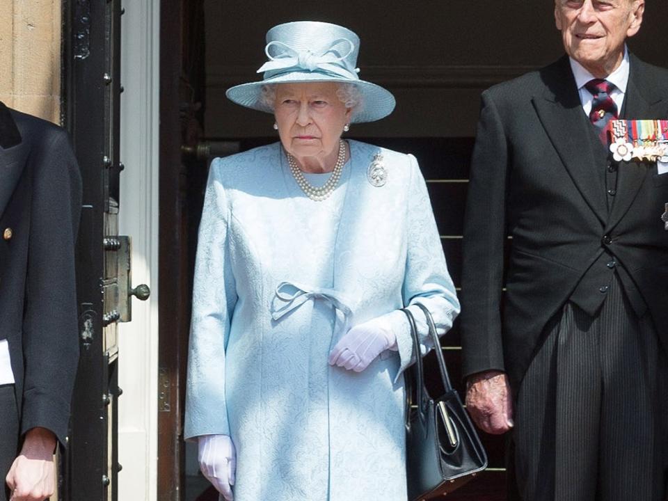 Queen Elizabeth wears light blue at Trooping the Colour in 2017.