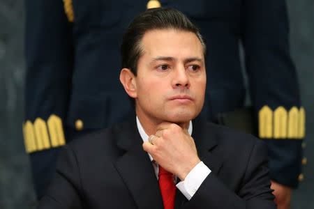 Mexico's President Enrique Pena Nieto gestures as he delivers a message about foreign affairs at Los Pinos presidential residence in Mexico City, Mexico, January 23, 2017. REUTERS/Edgard Garrido