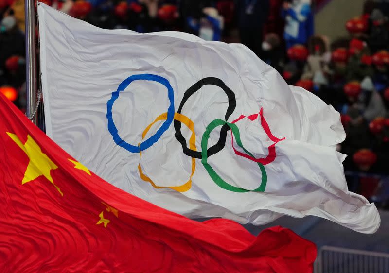 Flags at the 2022 Beijing Olympics closing ceremony.