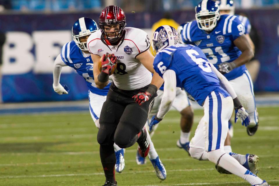 Tight end Travis Kelce runs after catching a pass during the Cincinnati Bearcats' game against the Duke Blue Devils in the Belk Bowl at Bank of America Stadium on Dec 27, 2012. Cincinnati won 48-34.