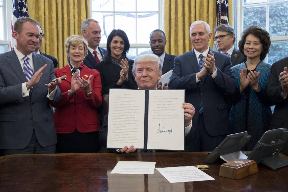 Trump signs an executive order entitled&nbsp;"Comprehensive Plan for Reorganizing the Executive Branch" on March 13, 2017.