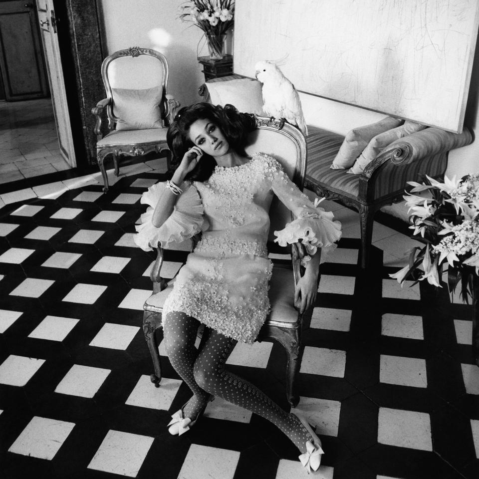 Marisa Berenson and friends model looks from Valentino Garavani’s all-white couture collection of 1968 in Cy Twombley’s apartment in Rome.