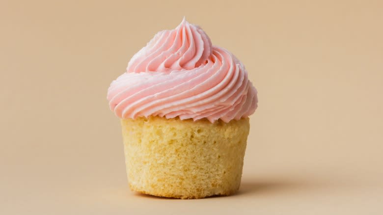 cupcake with pink whipped cream