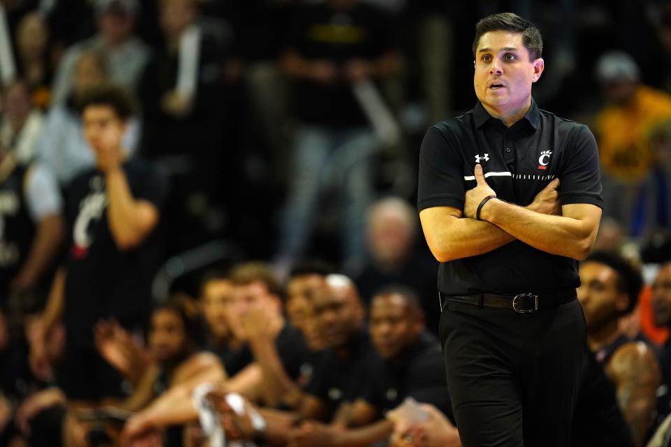 Cincinnati Bearcats head coach Wes Miller instruct the team in the first half during a college basketball game against the Northern Kentucky Norse, Wednesday, Nov. 16, 2022, at Truist Arena in Highland Heights, Ky.