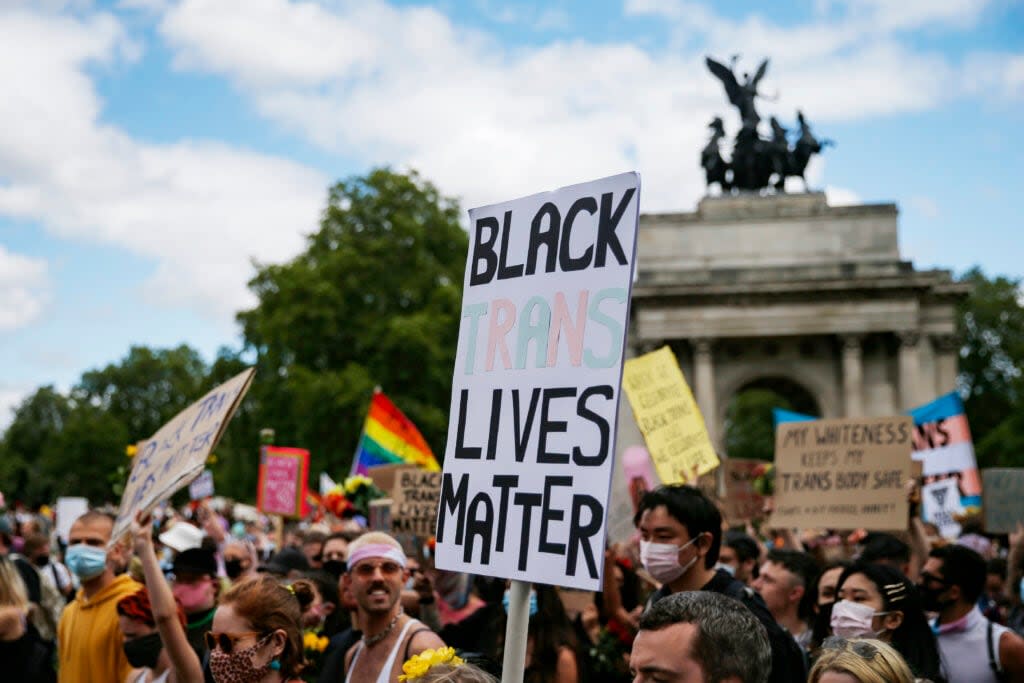 The Black Trans Lives Matter demonstrators gather at Wellington Arch on June 27, 2020 in London, England. The Black Trans Lives Matter march was held to support and celebrate the Black transgender community and to protest against potential amendments to the gender recognition act. (Photo by Hollie Adams/Getty Images,)