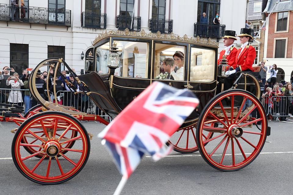 Princess Eugenie of York and Jack Brooksbank leave by carriage after their Wedding at at St. George's Chapel, Windsor Castle on October 12, 2018 in Windsor, England.