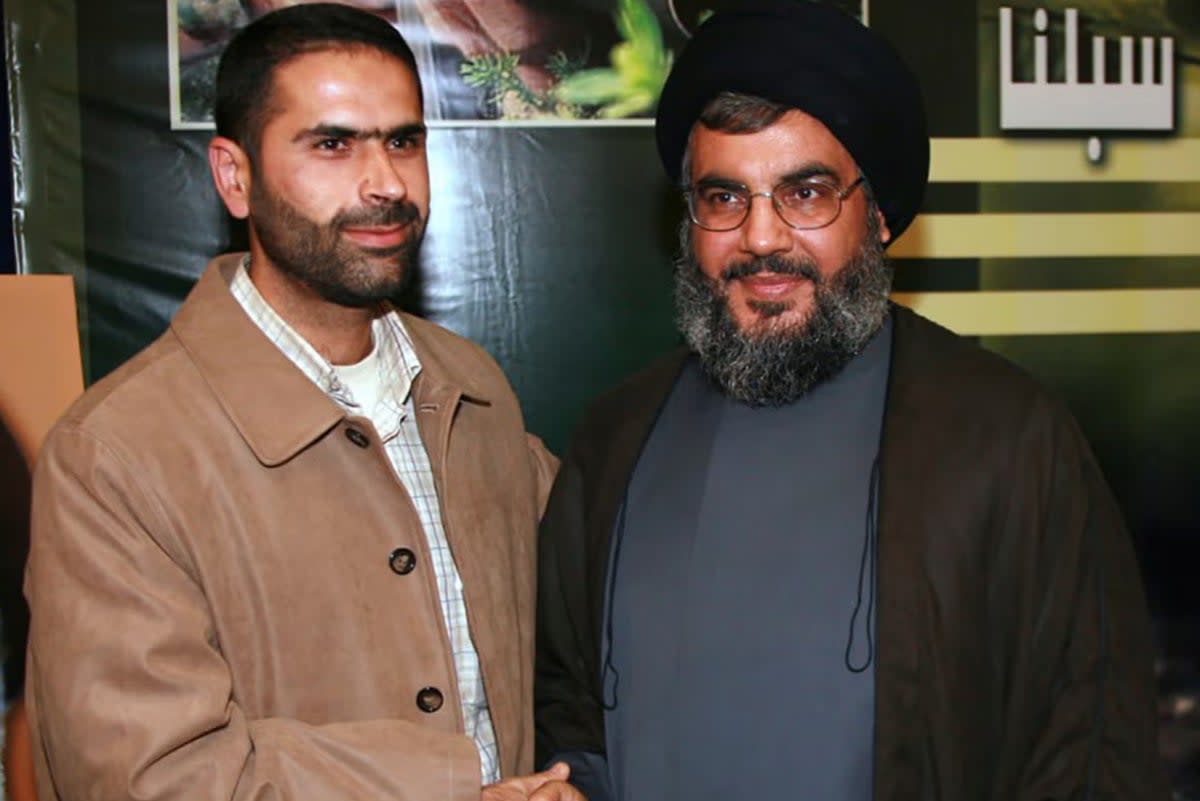 Hezbollah commander Wissam Tawil, left, with Hezbollah leader Hassan Nasrallah (Hezbollah Military Media via AP)