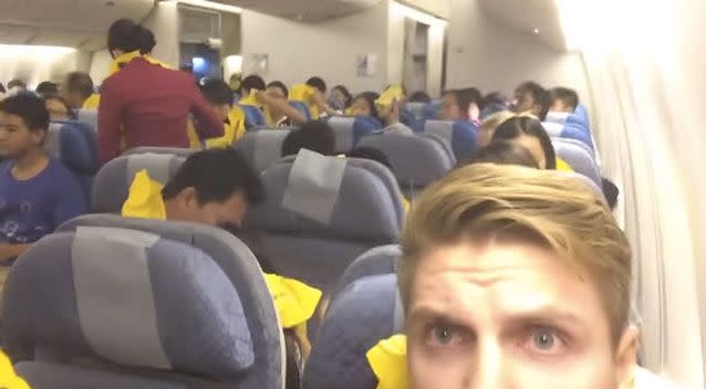 UK tourist Ethan Williams filmed as his flight prepared for an emergency landing while over the Pacific Ocean. Source: YouTube