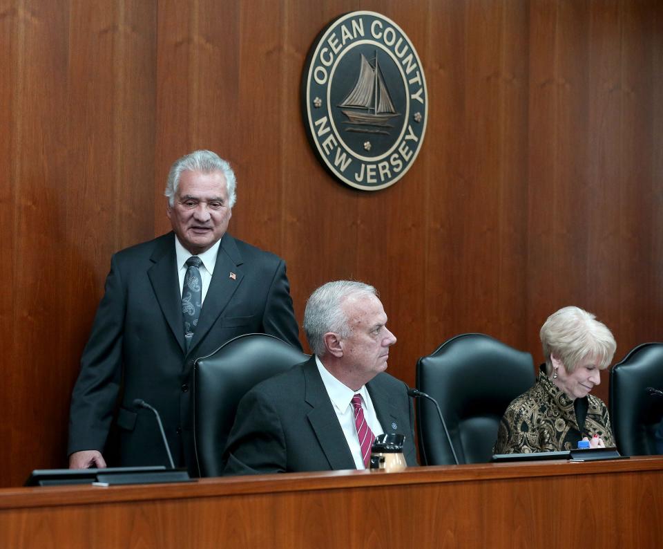 Newly appointed Ocean County Board Of Commisiioners Director Joe Vicari walks to his seat behind Deputy Director Gary Quinn and Commissioner Virginia E, Haines before their organizational meeting Wednesday, January 4, 2023, at the county's Administration Building in Toms River. 