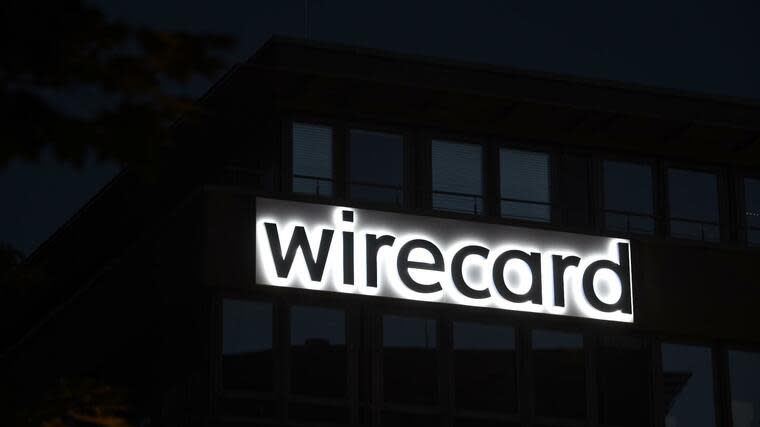 Der Schriftzug von Wirecard ist an der Firmenzentrale des Zahlungsdienstleisters zu sehen. Foto: dpa