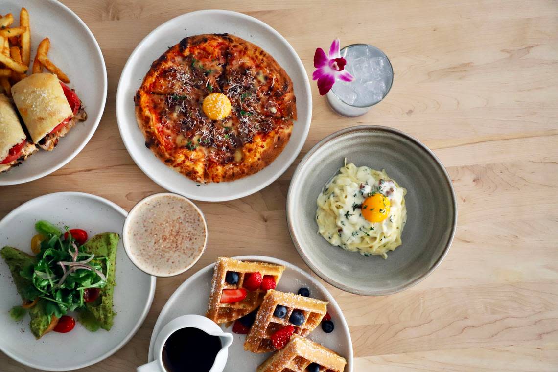 Brunch items at Il Modo include a pizza, waffle, avocado toast and chicken sandwich. Courtesy Kimpton Harper