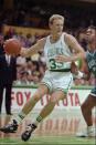 In this November 1991 file photo, Boston Celtics star Larry Bird during a game at the Boston Garden, in Boston. (AP Photo/Charles Krupa)