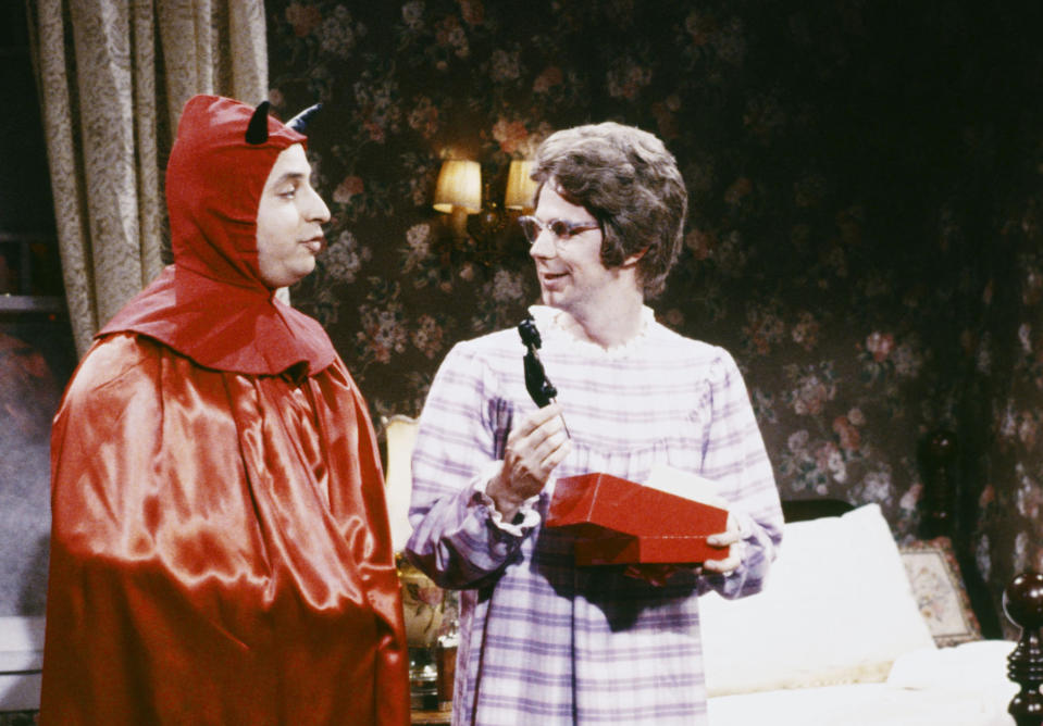SATURDAY NIGHT LIVE -- Episode 9 -- Pictured: (l-r) Jon Lovitz as Mephistopheles, Dana Carvey as Chuch Lady during the 'Christmas Eve' skit on December 17, 1988  (Photo by NBCU Photo Bank/NBCUniversal via Getty Images via Getty Images)