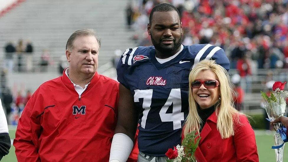 Michael Oher y sus padres de acogida