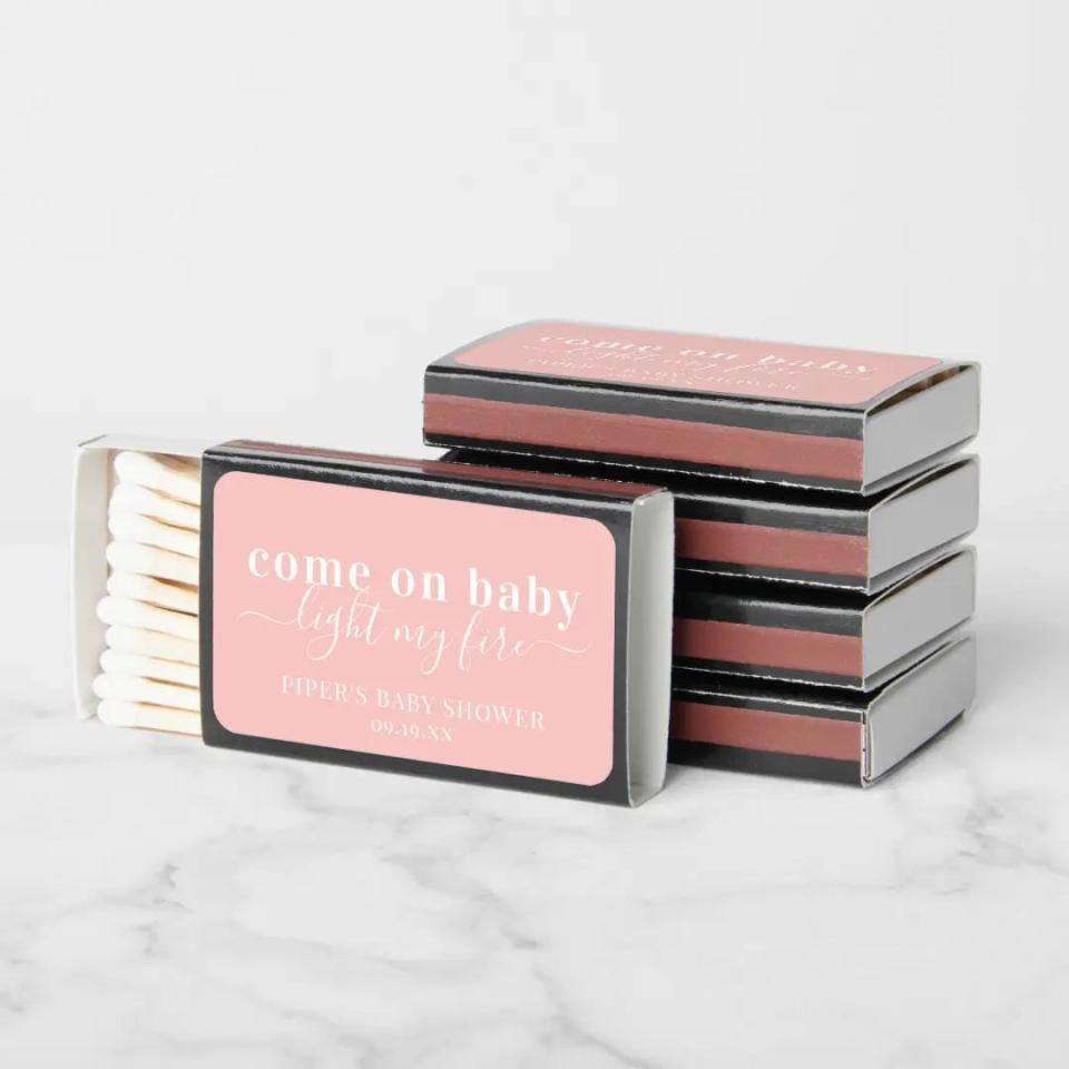 <p><a href="https://go.redirectingat.com?id=74968X1596630&url=https%3A%2F%2Fwww.zazzle.com%2Flight_my_fire_pink_baby_shower_favor_matchboxes-256605019128698592&sref=https%3A%2F%2Fwww.womansday.com%2Flife%2Fg28107872%2Fbaby-shower-favors%2F" rel="nofollow noopener" target="_blank" data-ylk="slk:Shop Now;elm:context_link;itc:0;sec:content-canvas" class="link ">Shop Now</a></p><p>"Come on Baby Light My Fire" Baby Shower Matchboxes</p><p>zazzle.com</p><p>$36.13</p><span class="copyright">IYHTVDesigns</span>