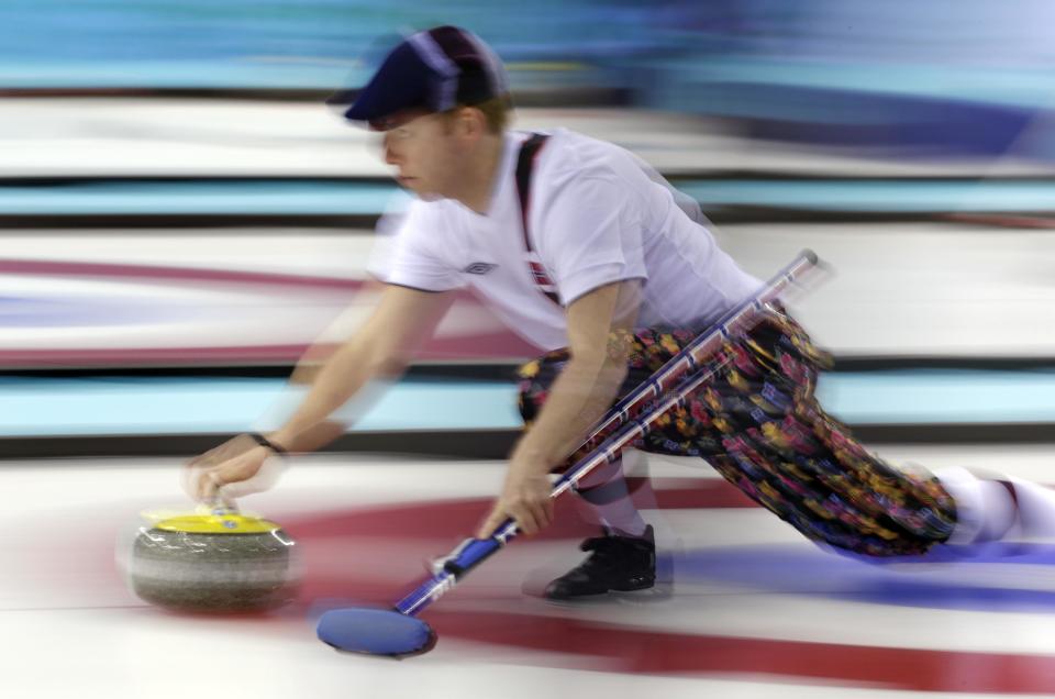 Norway's Torger Nergaard delivers the stone during men's curling training at the 2014 Winter Olympics, Saturday, Feb. 8, 2014, in Sochi, Russia. (AP Photo/Robert F. Bukaty)