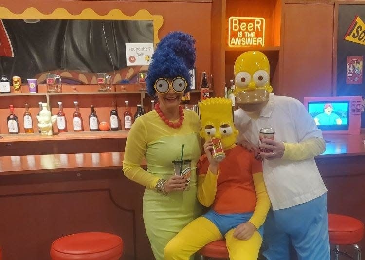 Marge, Bart and Homer make an appearance at Moe's Tavern Pop-Up.